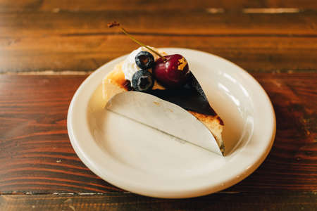 Basque Burnt Cheesecake served on a small white dish.
