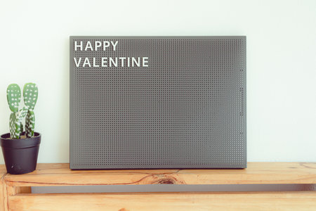 Announce pegboard with text Happy Valentine in concept of love and Valentine.の写真素材