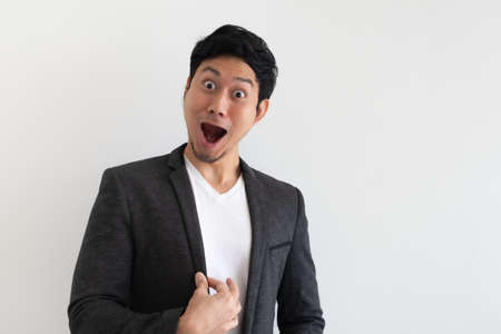 Happy and surprise face of Asian business man in concept of business success.の写真素材