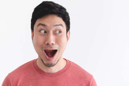 Wow and shocked face of funny Asian man isolated on white background.
