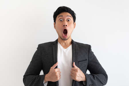 Happy and surprise face of Asian business man in concept of business success.の写真素材