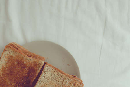 Minimal simple homemade toasted bread with copy space.の写真素材