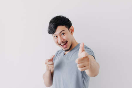Smile and happy Asian man is proud to present and offer for an advertisement.の写真素材