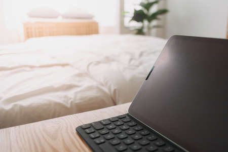 Close up of tablet in the room. Concept of work from home.の写真素材