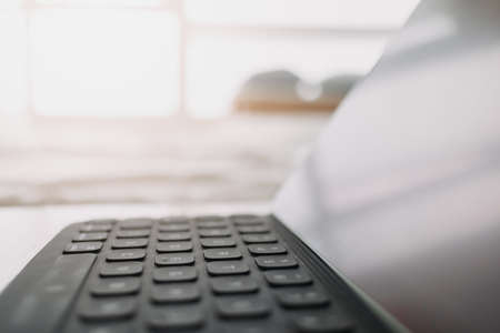 Close up of tablet in the room. Concept of work from home.の写真素材