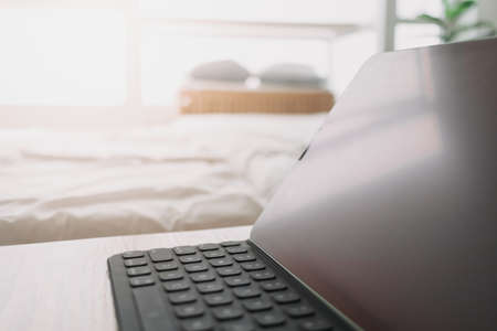 Close up of tablet in the room. Concept of work from home.の写真素材