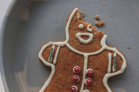 Close up of Gingerbread man cookies served in grey dish.の写真素材