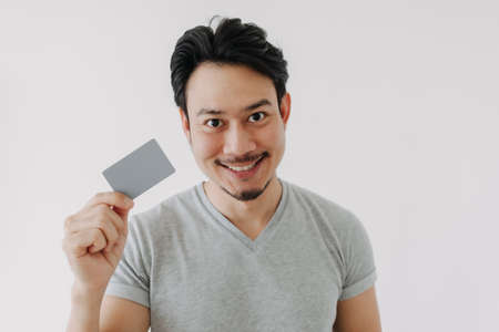 Happy funny face Asian man show off his empty card on white background.