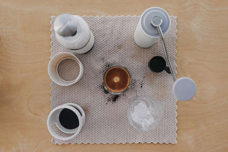 Above view of french press coffee with marble crema.