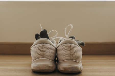 White running shoes or jogging sneaker dry on the for after workout.の写真素材