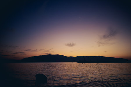 Beautiful clam sunset ocean in Vlore city, Albania.の写真素材