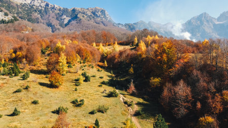 Ariel drone shot of Theth - Valbona hiking trail in autumn, Albania.の写真素材