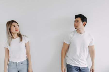 Advertisement copy space of boring face asian lover couple isolated on white.