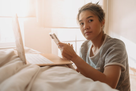 Asian woman online chat with customer. Concept of online selling business.の写真素材