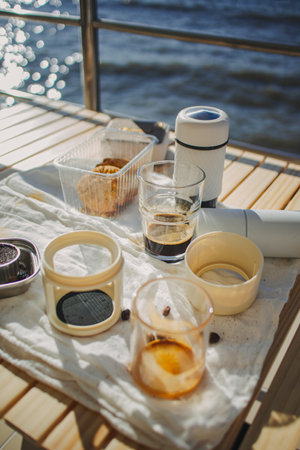 Set of picnic camping with folding chair and table, Manual grinder and coffee press, beautiful...