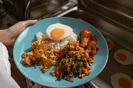 Mix of Thai breakfast meal in the dish from the buffet line hotel.の写真素材