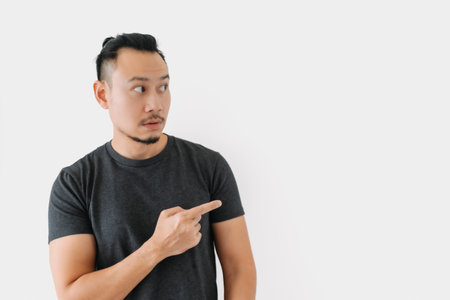 Normal face Asian freelance man bun hair in black on white.の写真素材