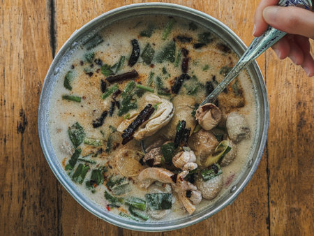 Tom Kha Kai or Thai Chicken Coconut Milk Soup, traditional Thai sour soup.の写真素材