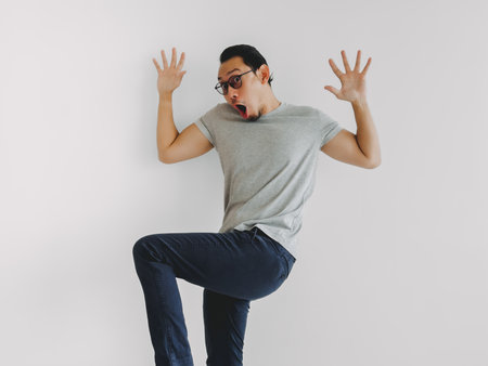 Half body photo of shock and surprise Asian man isolate on white background.の写真素材