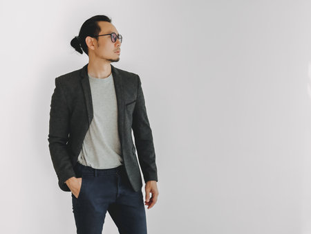 Half body photo of Asian business man stand isolate on white.の写真素材