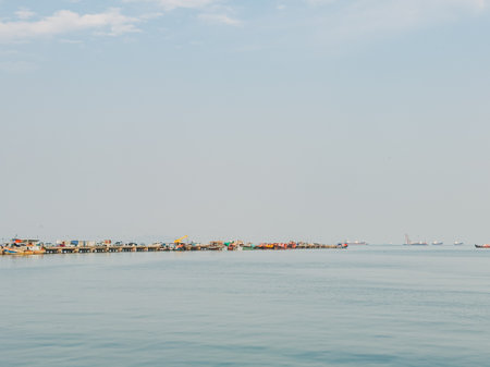 Colorful Thai jetty for ship to load seafood stuff and people in Thailand.の写真素材