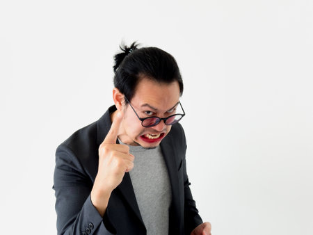Geek nerd Asian business man do angry denying pose on white background.の写真素材