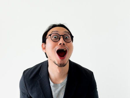 Close up face of Asian business man has got an idea to solve the problem to offer.の写真素材