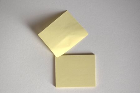 Two yellow tickets on a white backgroundの写真素材