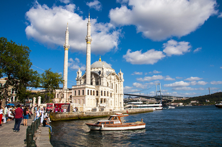 Istanbul, Turkey - August 26, 2017: Peoples enjoy sunny day near Ortaky Mosque in Ortaky, on the shore of Bosphorous in Istanbulのeditorial素材
