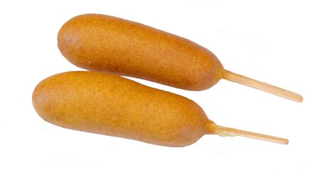 Two breaded hot dogs on sticksの写真素材