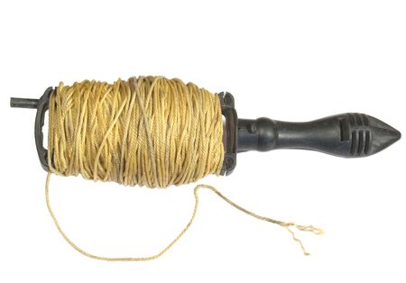 Spool of string line photo on white backgroundの写真素材