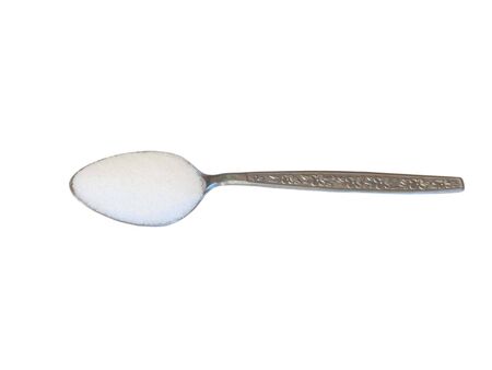 Sugar and spoon photo on white backgroundの写真素材
