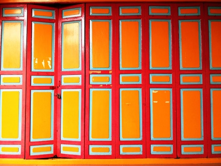 Old Red and Yellow Wooden Doorの写真素材