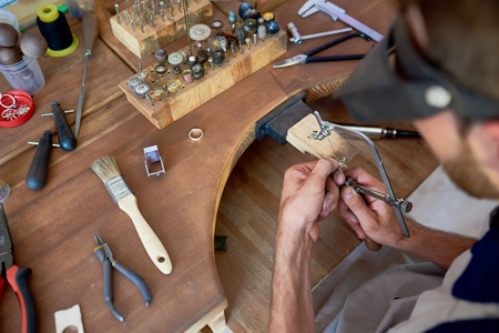 Craftsman Making Metal Flowerの写真素材
