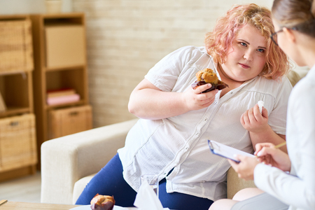 Obese Woman with  Eating Disorderの写真素材