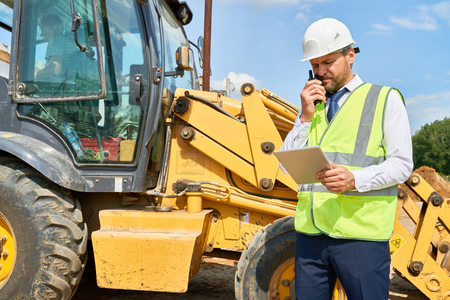 Construction Supervisor Working on Siteの写真素材