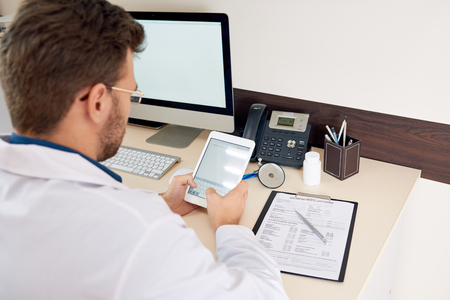 Doctor Working at deskの写真素材