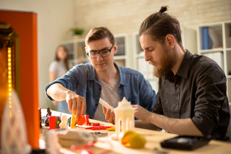 Young Architects Using 3D Printer