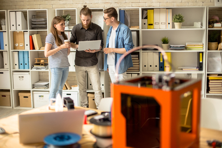 Group of Creative People in Design Studio