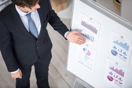 Businessman Giving Presentation in Officeの写真素材