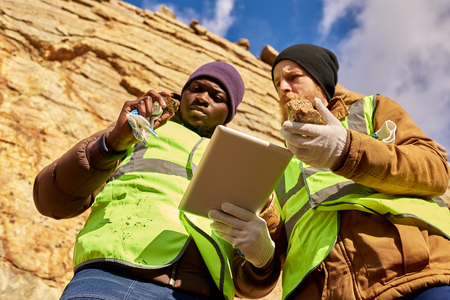 Miners Inspecting Worksite Searching for Minerals