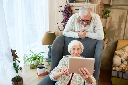 Senior Woman Using Digital Tabletの写真素材