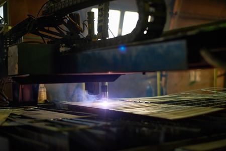 Interior of production department of modern plant: laser cutting sheet metal, no peopleの写真素材
