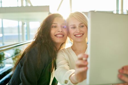 Taking Selfie with Friendの写真素材