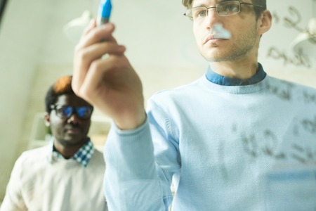 IT Specialist Witting on Glassの写真素材