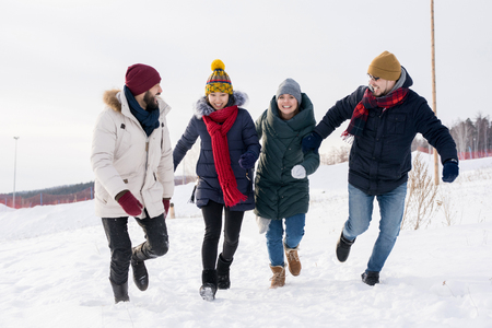 Young People Having Fun in Winterの写真素材