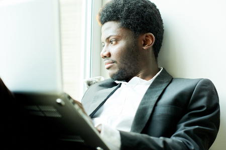 Portrait of Pensive Young Businessmanの写真素材