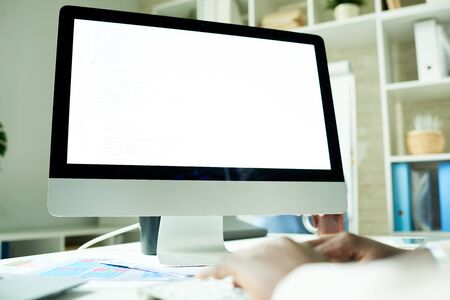 Using Computer with Blank Screenの写真素材