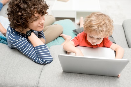 Little Boy Using Laptop