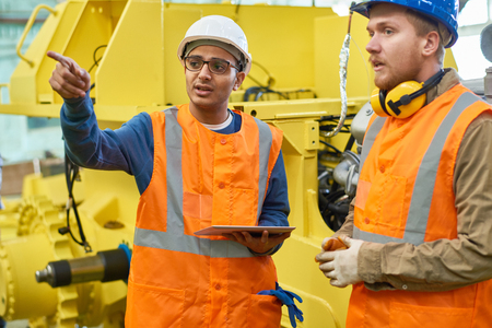 Two Workers at Modern Plant